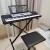 Yamaha keyboard with stand and bench