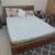 Queen bed with side table -