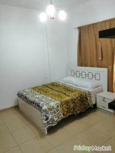 Master Bedroom With Window, Big Wardrobe, And Attached Bathroom - UAE