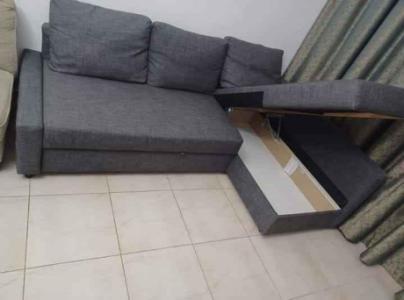 L shape sofa bed with storage same like new conditions nead and clean