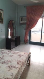 Fully furnished independent room available for single executive lady in Al Qusais